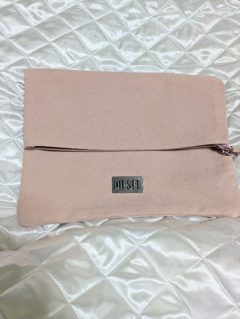 DIESEL ピンク クラッチバッグ