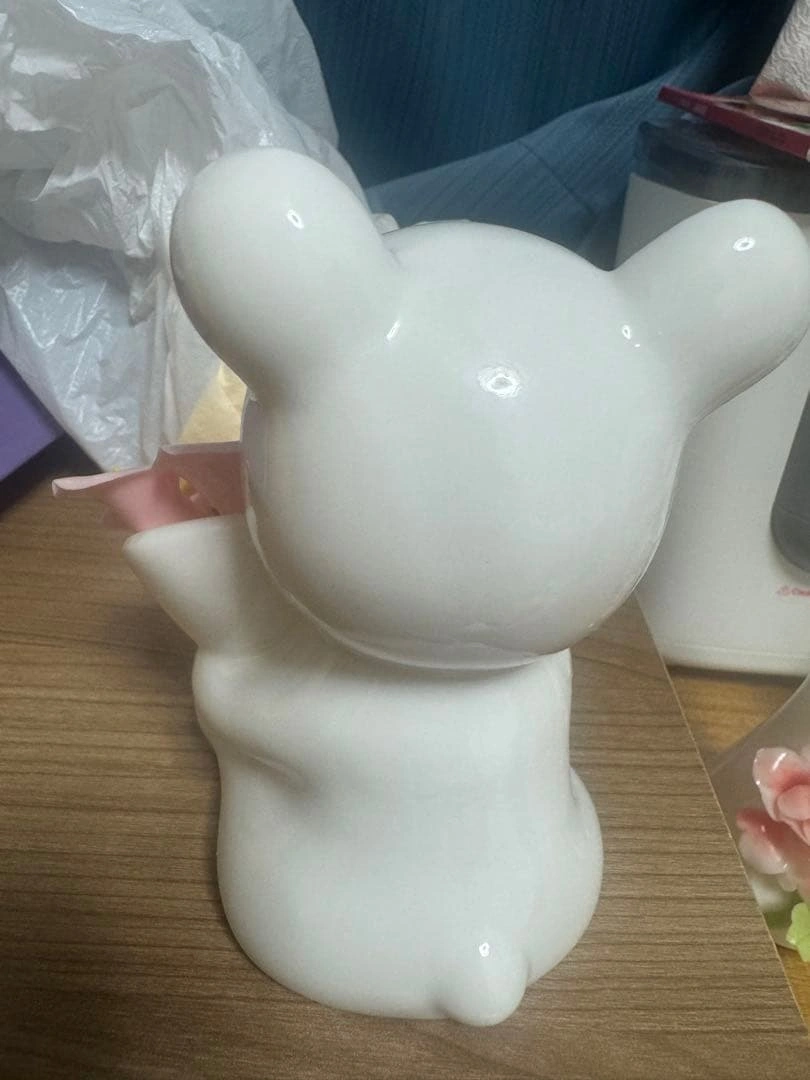 陶器 クマ型 置物 花の装飾付の写真2枚目
