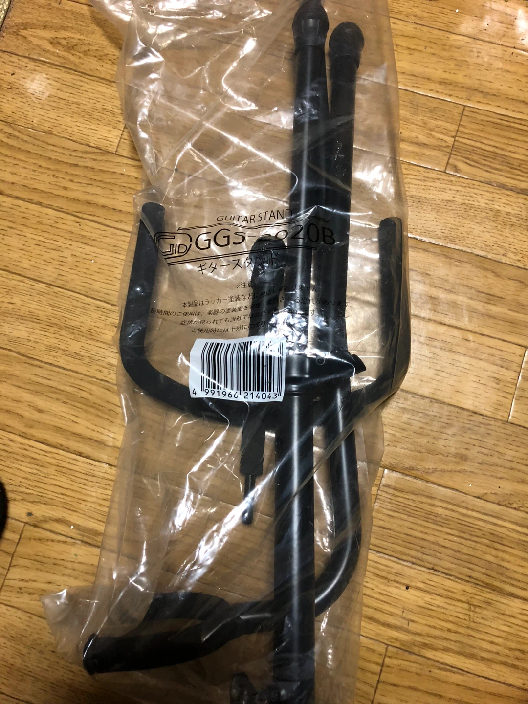 早い者勝ち他店にも出品2点セット　新品未開封のギタースタンド、中古譜面台