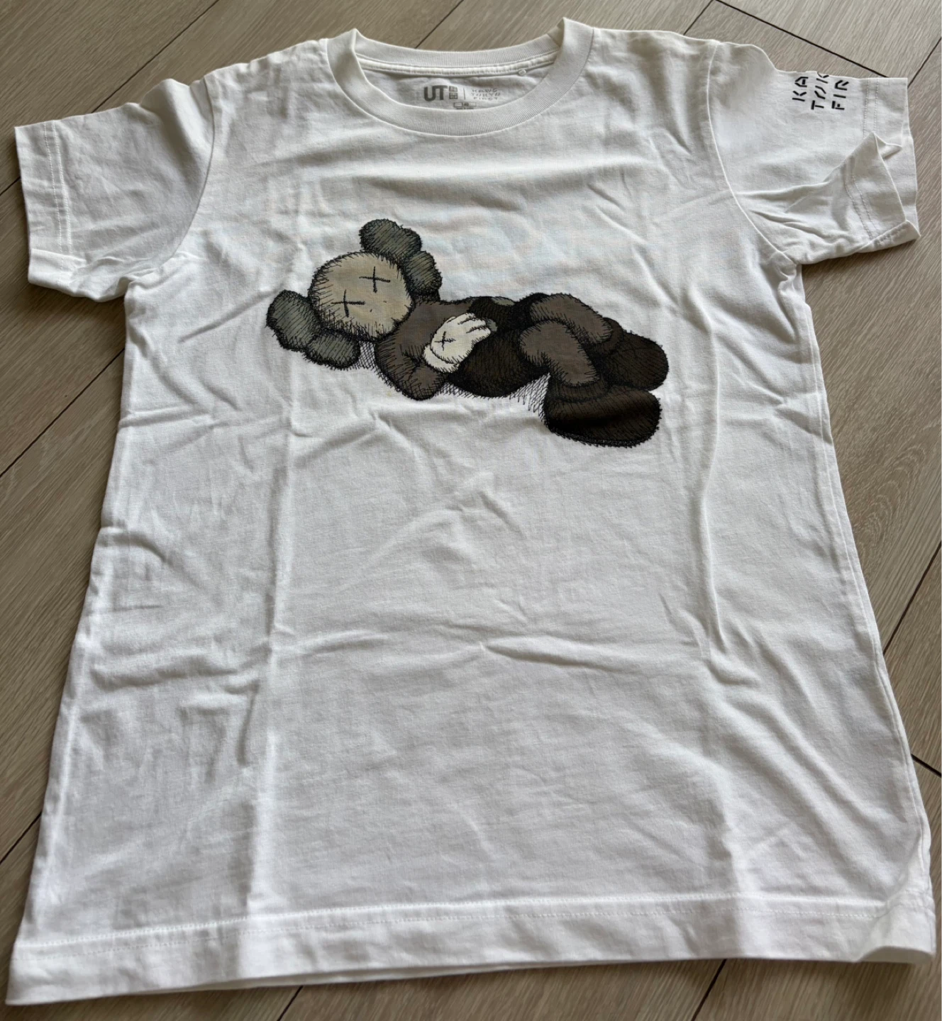 ユニクロ カウズ 半袖Tシャツ 白 140cm