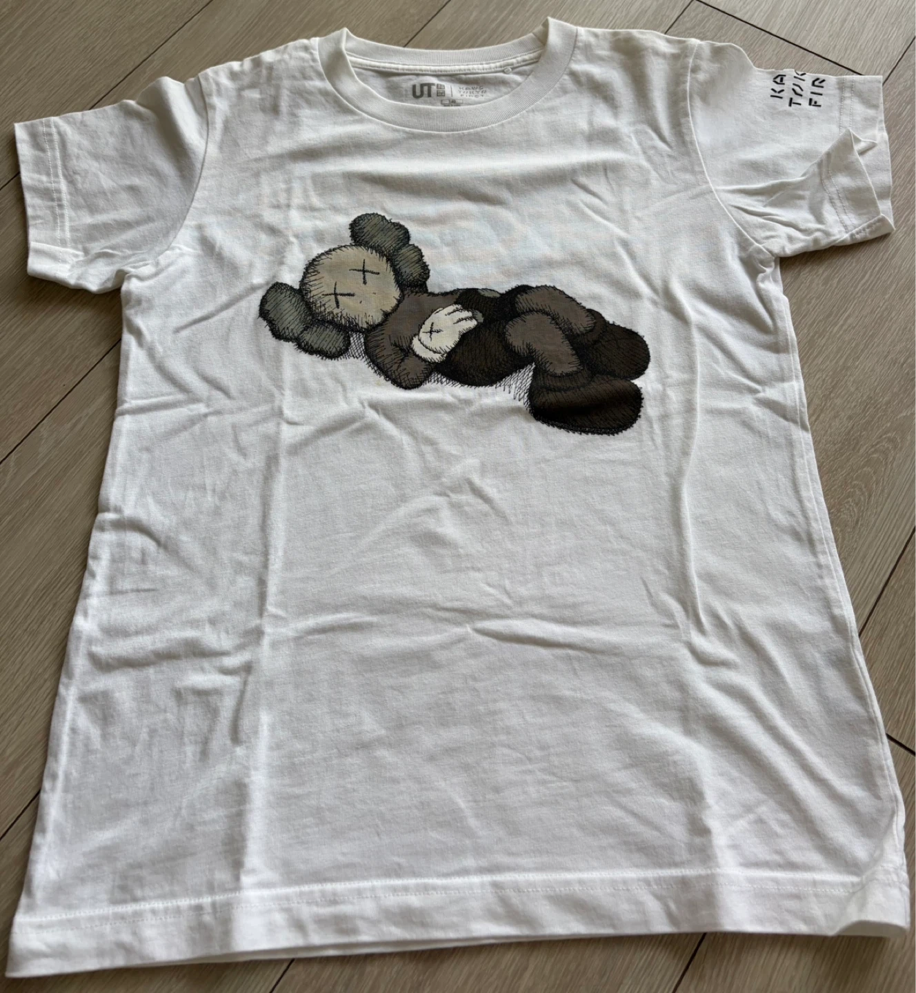 ユニクロ カウズ 半袖Tシャツ 白 140cm