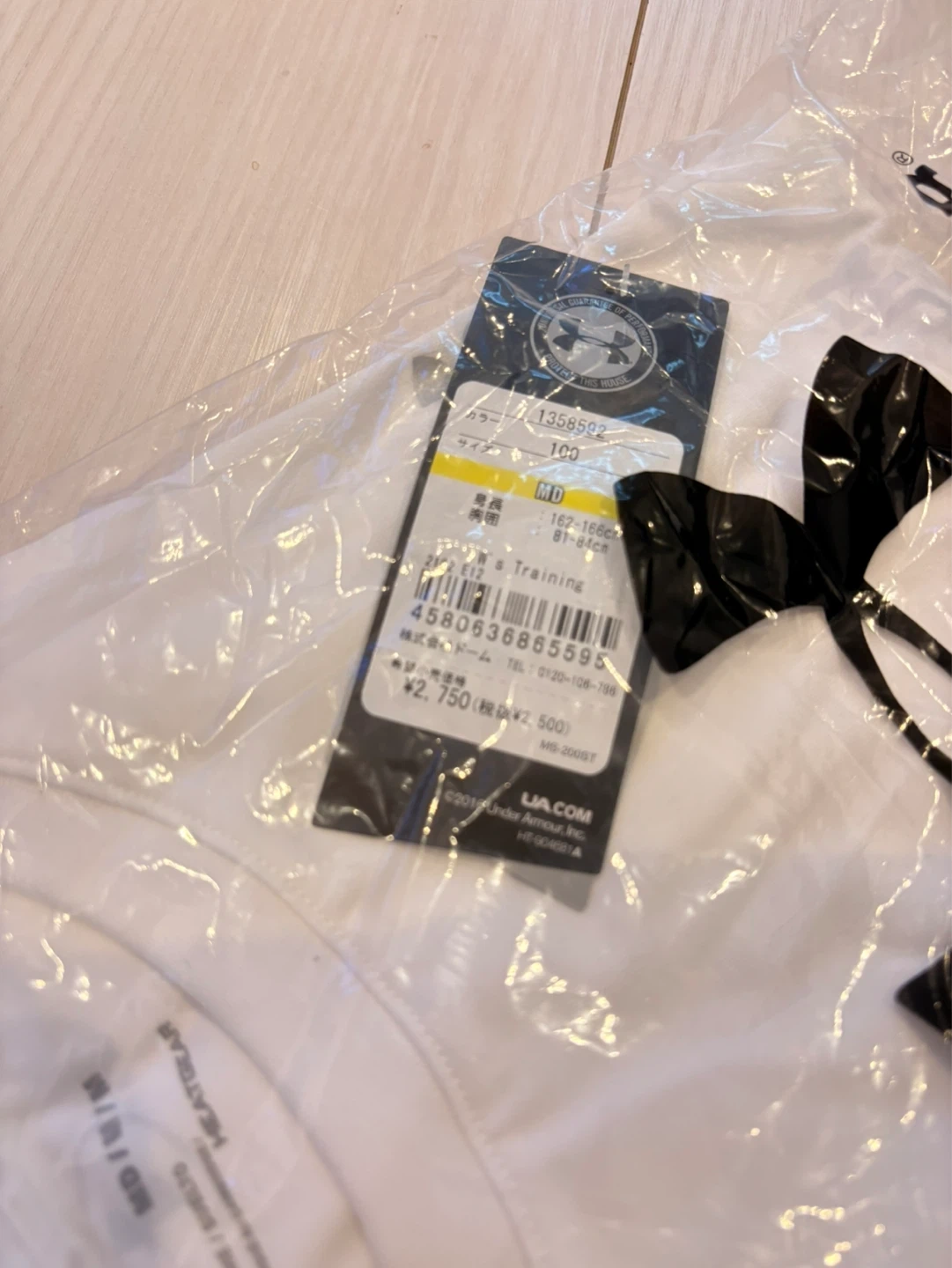 【新品未使用】定価¥2750 アンダーアーマー Tシャツ ホワイト MDサイズの写真2枚目