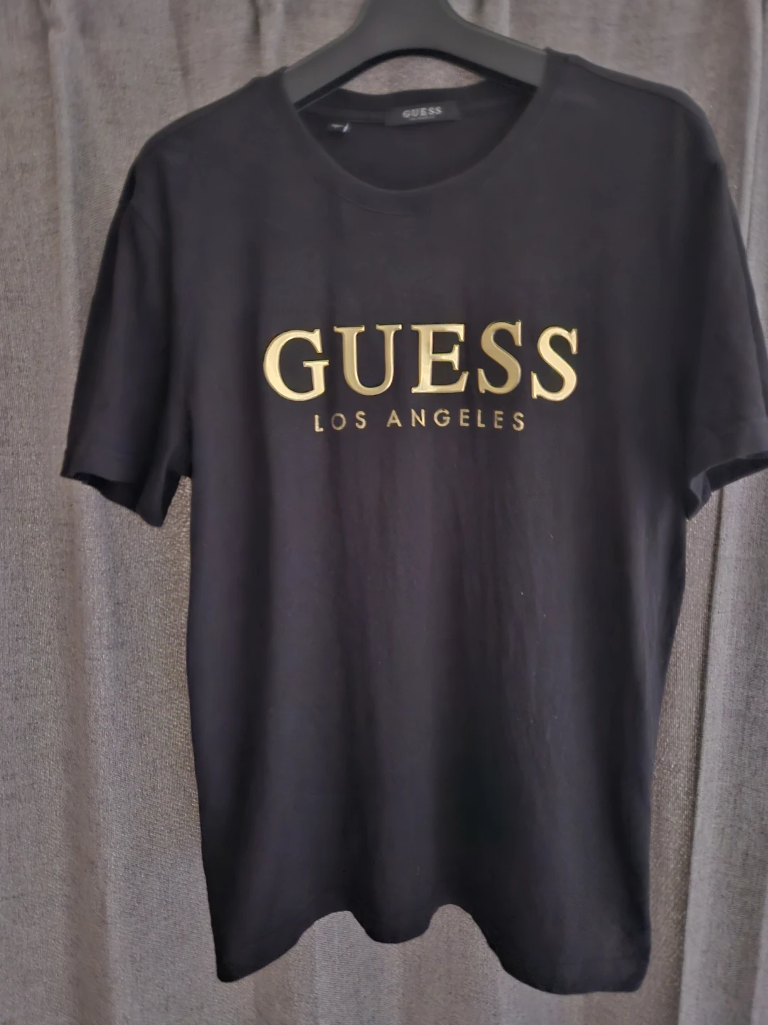 ゲス 半袖Tシャツ 黒 金ロゴ
