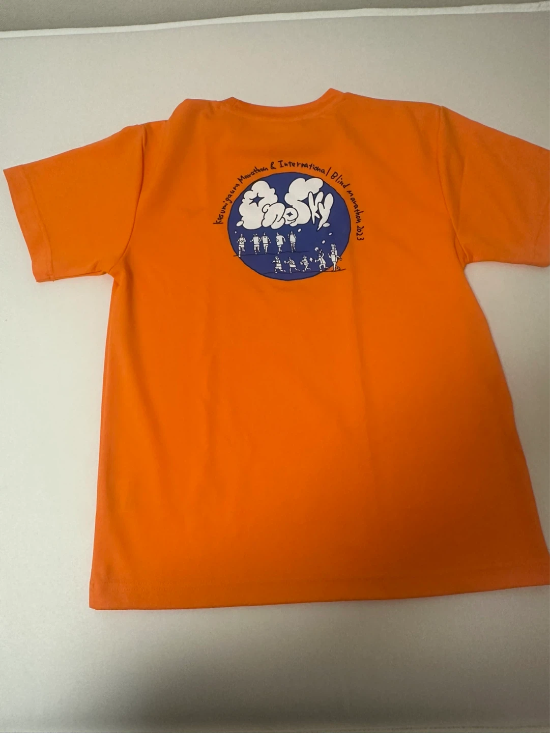 新品　ミズノ Tシャツ オレンジ 2023大会記念の写真2枚目