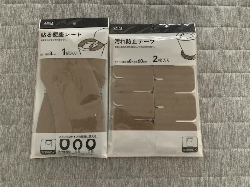 新品・未開封。CAINZの汚れ防止テープと貼る便座シートのセット