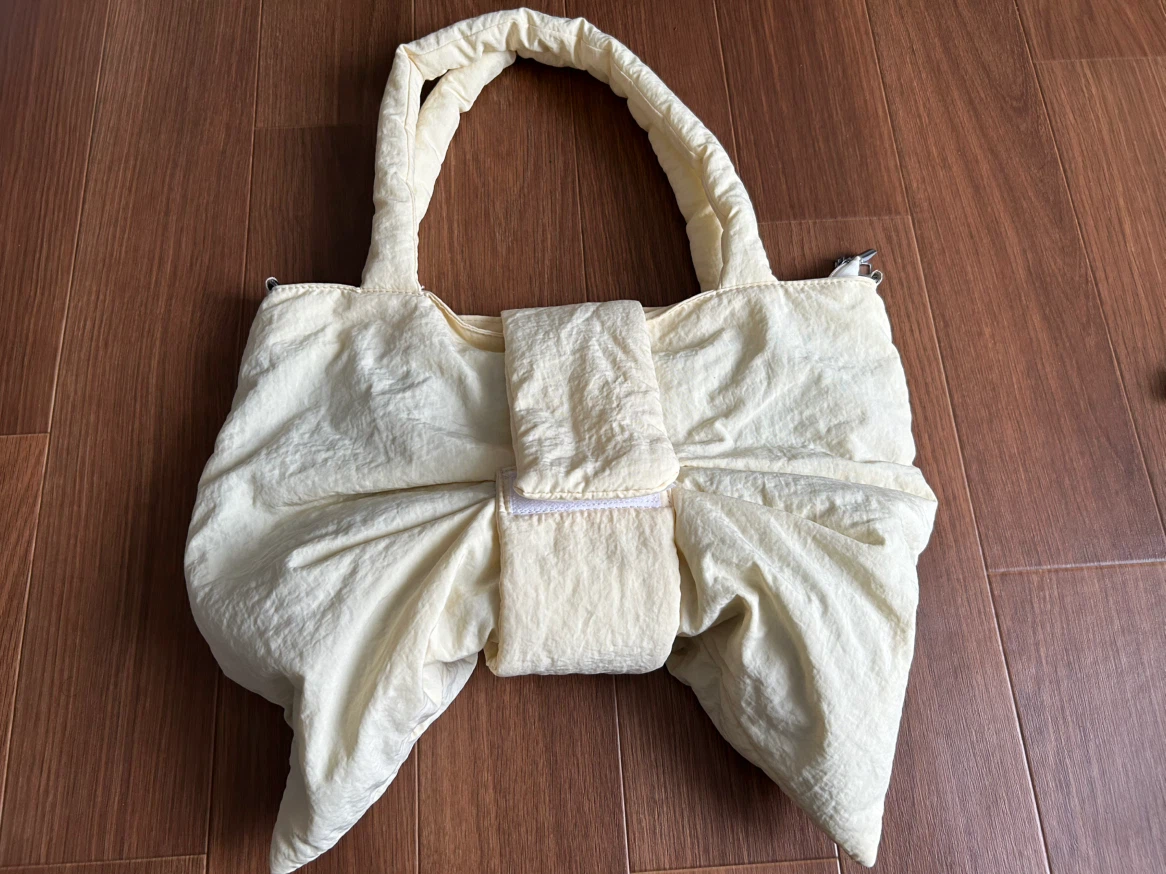 NOROMORO ビッグリボン パデッドバッグ 2way クリームイエローの写真2枚目