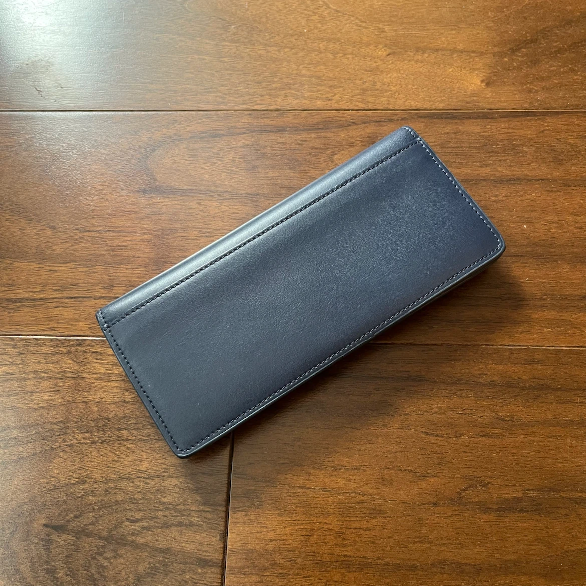 【FURLA フルラ 長財布 】ネイビー フラップ式 ボタン不良の写真3枚目