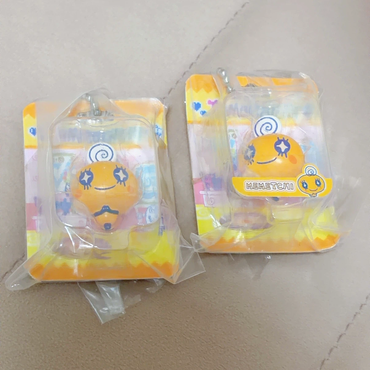たまごっち めめっち ガチャポン フロッキーマスコット パッケージチャーム てんしっち おはじき風シール おすそ分けの写真7枚目