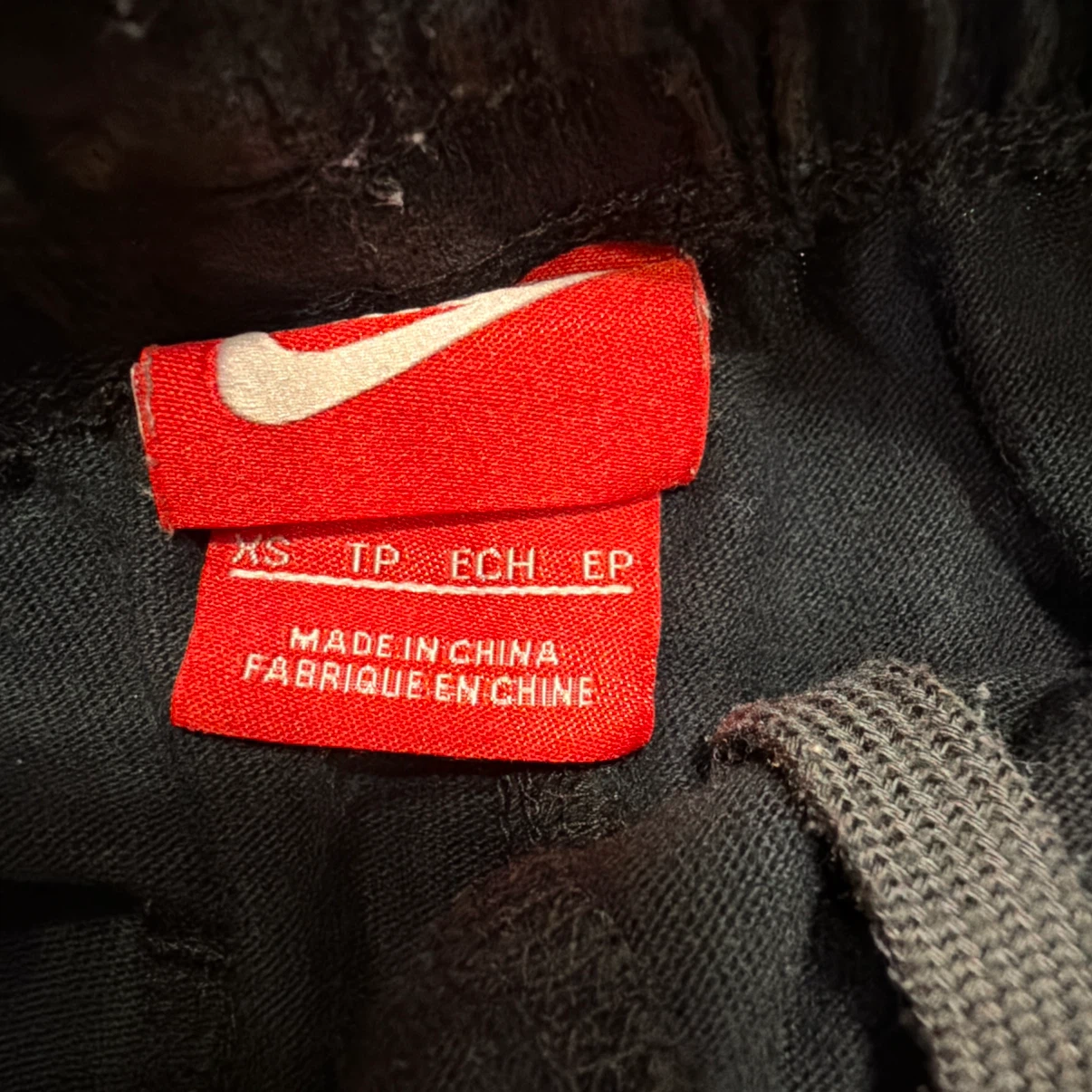 NIKE ショートパンツ ブラック ネオンイエロー　XSの写真3枚目