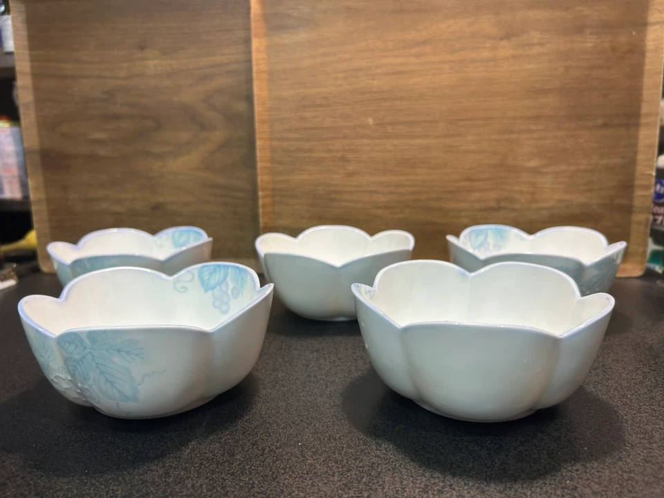 5 flower shaped bowls with blue grape vine design