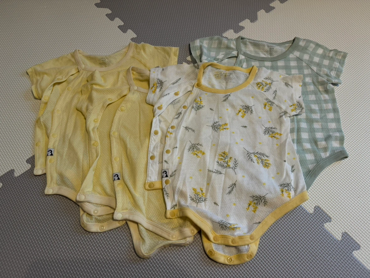 コニー Newborn コットンメッシュボディスーツ4枚セット