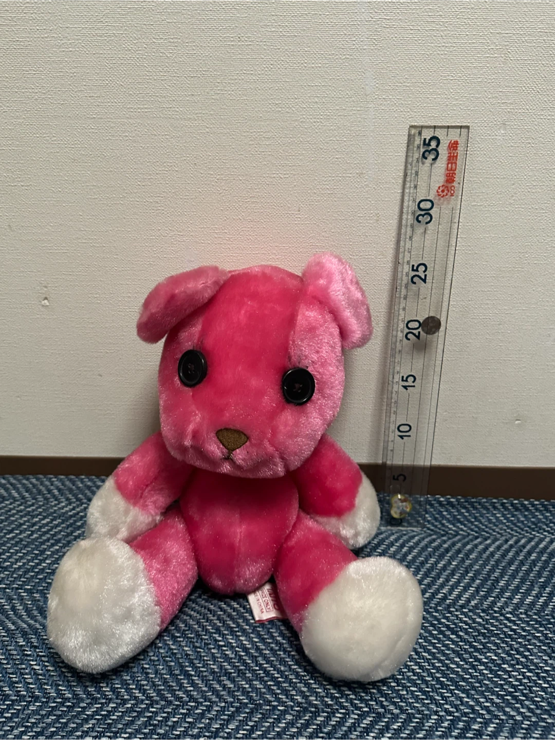 ピンクのくまのぬいぐるみ