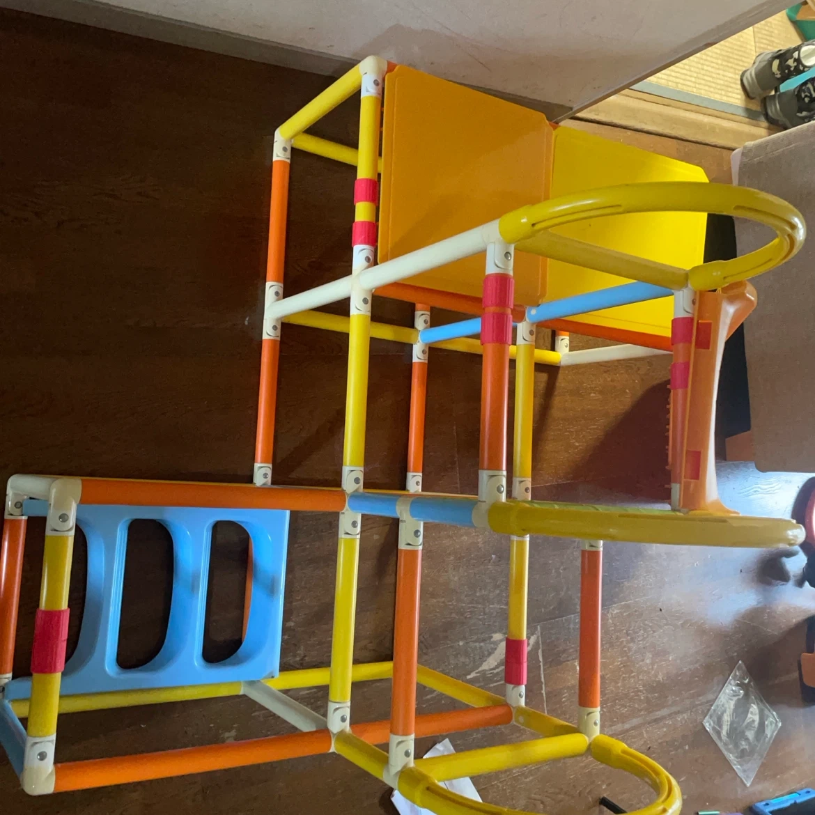 A slide and jungle gym with minor damage
