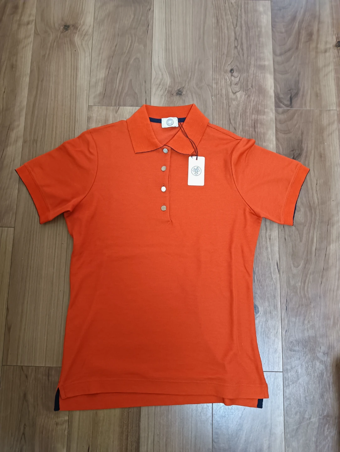 未使用品。HERMES エルメス セリエメタルボタン ポロシャツ