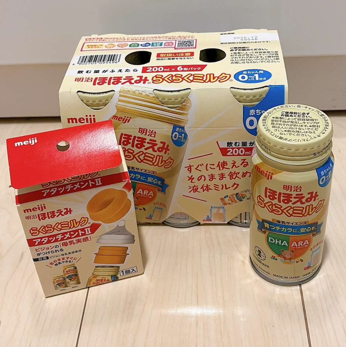 明治 ほほえみ らくらくミルク 6缶パック+1本・アタッチメント